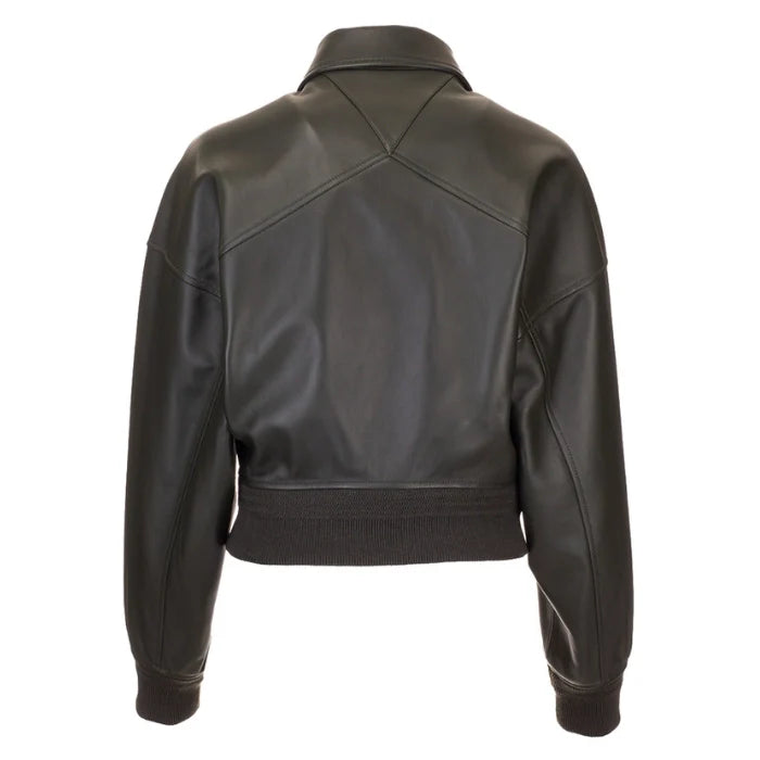 A black leather bomber-style jacket with a pointed collar, ribbed cuffs, and a silver zipper.